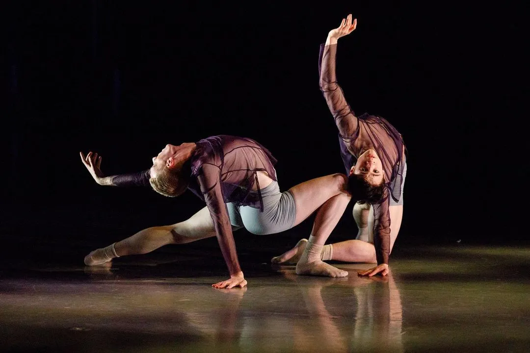 Two dancers perform in Jera Wolfe’s Arise onstage.