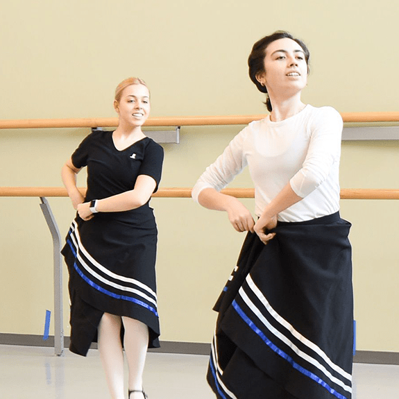 Aspiring teachers participate in a world dance class